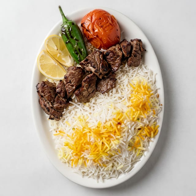 Lamb Seekh Kabab with Rice.